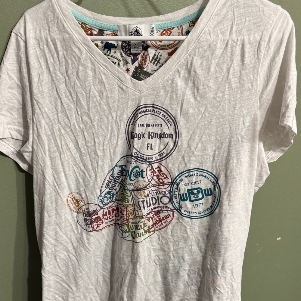 Disney White Graphic Tee with Colorful Stamps